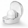 White hat cleaning machine with a bottle of hat cleaner on a white background